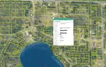 Half acre vacant lot in Baldwin, Lake CO. MI with views of Bush Lake! Rec capital of MI!