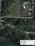 Half acre vacant lot in Baldwin, Lake CO. MI with views of Bush Lake! Rec capital of MI!