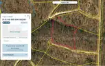 10 wooded acres in Missouri next to hunting reserve bid on payment!