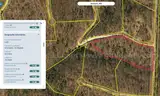 10 wooded acres in Missouri next to hunting reserve bid on payment!