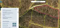 10 wooded acres in Missouri next to hunting reserve bid on payment!