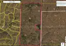 10 wooded acres in Missouri next to hunting reserve bid on payment!