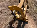 Walk&#x27; n&#x27; Roll Rear Attachment that fits on Caterpillar 140M Motor Grader