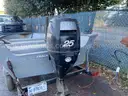 Tracker V-hull boat & trailer,  with 25 HP Mercury outboard motor