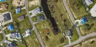 Coveted Corner Lot with direct Canal Access &#x2013; 0.26 Acres | Cape Coral, FL