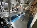 Multi tier conveyor belt distribution system