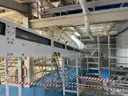 Multi tier conveyor belt distribution system