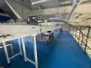 Multi tier conveyor belt distribution system