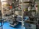 Multi tier conveyor belt distribution system