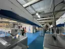 Multi tier conveyor belt distribution system