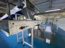 Multi tier conveyor belt distribution system
