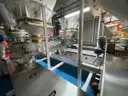Multi tier conveyor belt distribution system