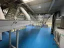 Multi tier conveyor belt distribution system