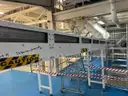 Multi tier conveyor belt distribution system
