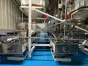 Multi tier conveyor belt distribution system