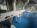 Multi tier conveyor belt distribution system