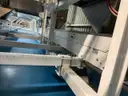 Multi tier conveyor belt distribution system