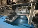 Multi tier conveyor belt distribution system