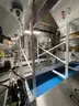 Multi tier conveyor belt distribution system