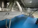Multi tier conveyor belt distribution system