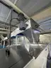 Multi tier conveyor belt distribution system