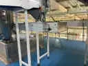 Multi tier conveyor belt distribution system