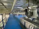 Multi tier conveyor belt distribution system