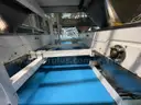 Multi tier conveyor belt distribution system