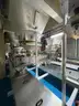 Multi tier conveyor belt distribution system