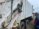 1999 White GMC Autocar w/Leach 2RII Rear Loader Packer
