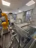 Fully Automated Station for Loading / Unloading Components from Assembly