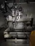 Fully Automated Stations for Screwing with Robots