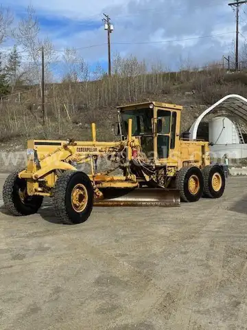 1991 Cat Motor Grader 140G AWD - Snow Wing, Snow Tires, Scarifier Included