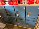 Sixteen (16) bay 3.5x5x3 feet secure lockers attached