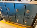 Sixteen (16) bay 3.5x5x3 feet secure lockers attached