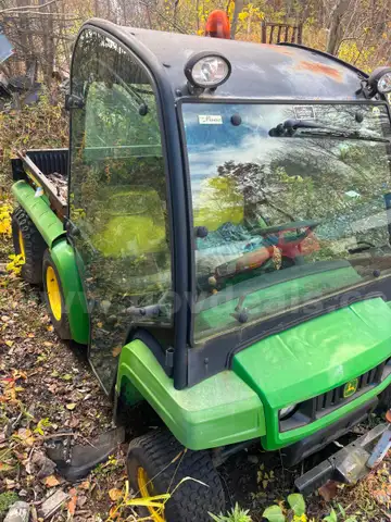 John Deere Gator 6x4 w/ plow/sanders