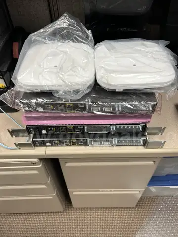 Network Equipment- 4x Cisco 4321 Routers, 2 Cisco 27021 Wireless Access Point