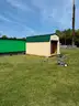 10X16 STORAGE BUILDING WITH ROLL UP DOOR AND MAN DOOR