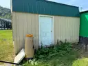 10X16 STORAGE BUILDING WITH ROLL UP DOOR AND MAN DOOR