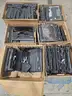 large quantity of assorted laptop parts.