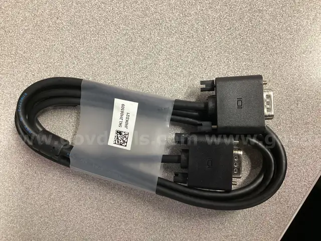 Dell 5KL2H06509 VGA cable (standard 15-pin analog), you need a converter that changes your laptop's digital output into