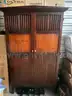 Large dresser with doors and shelf’s 6’x4’Color burgundy