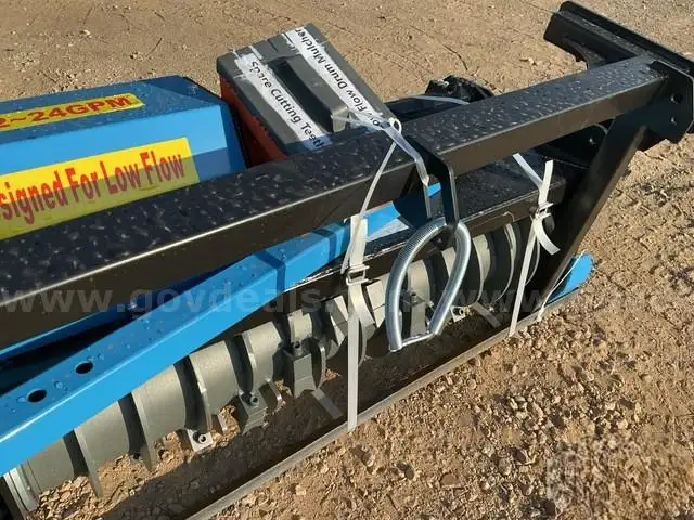 RAINTREE RMBD50 is a drum forestry mulcher designed for low-flow skid steer