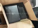 20 boxes of laptops and chromebooks
