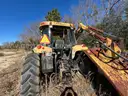Challenger Tractor with Boom Mower Attachment