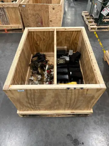 Crate of Foot Pedals and Regulators