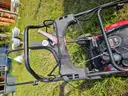 2 lawn mowers and Weed Eater