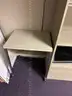 Lot of standing desk converters and office supplies