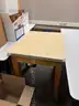 Lot of standing desk converters and office supplies