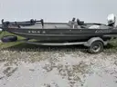 Lowe boat trailer and motor